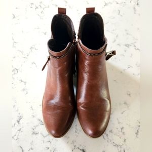 Cognac coloured western style ankle boots with zipper details on both sides